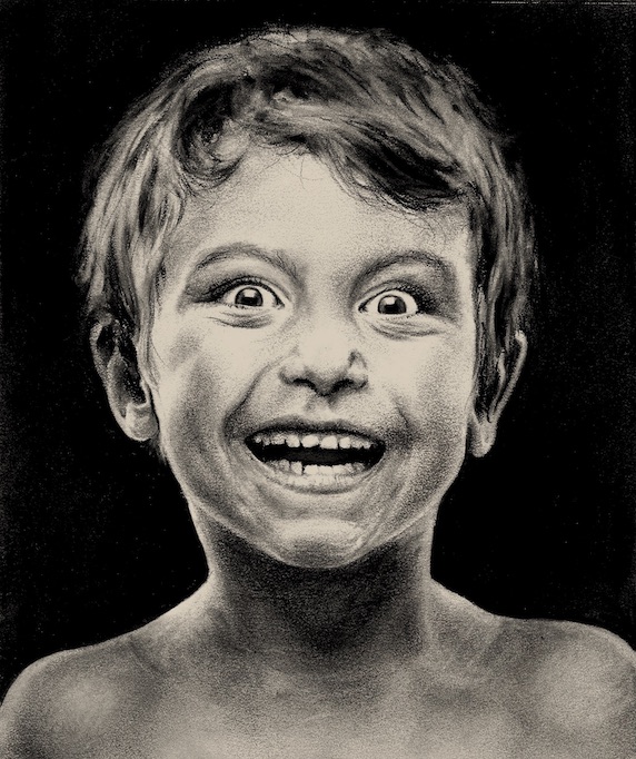 Charcoal drawing of a smiling boy